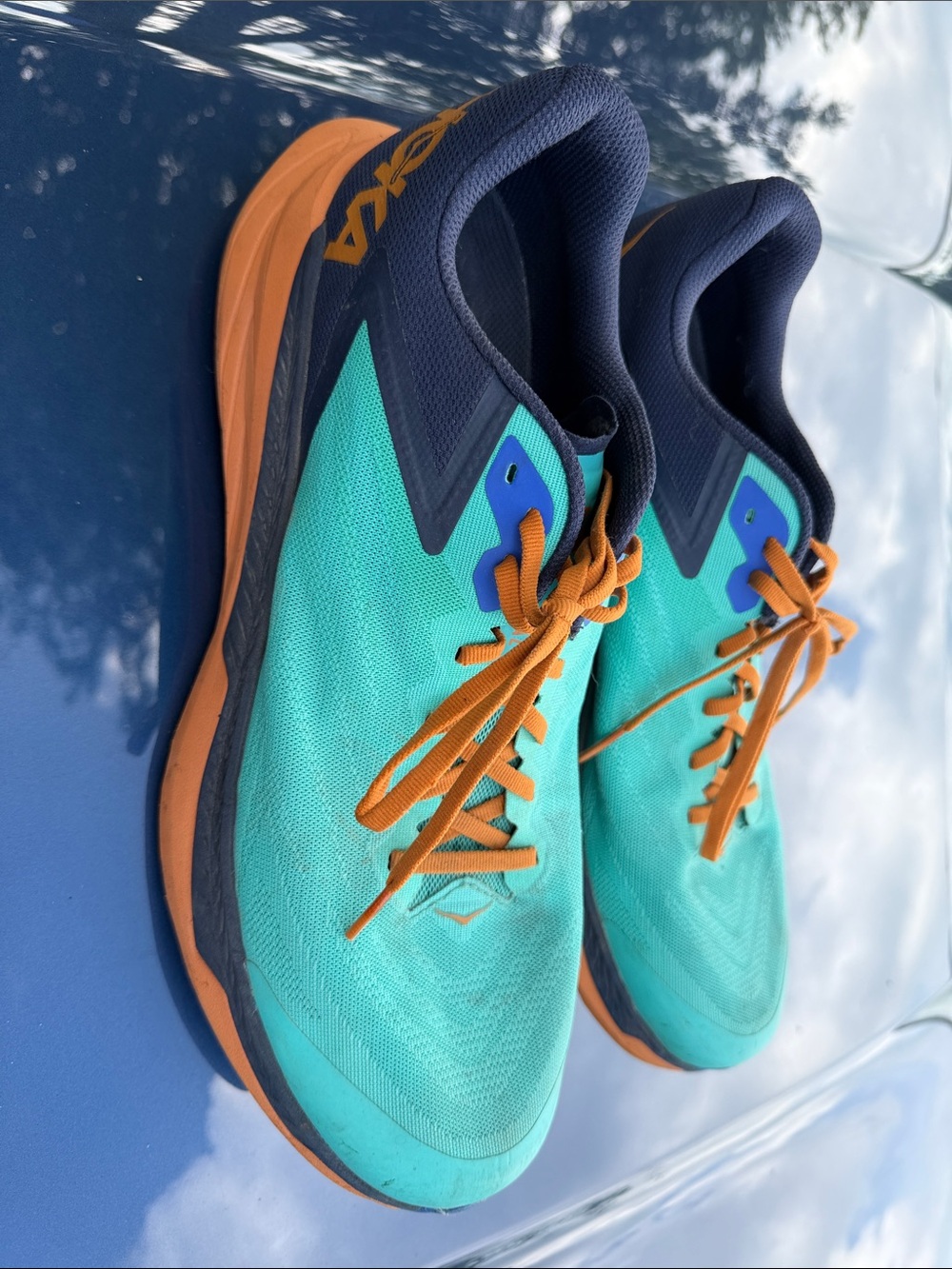 Hoka Teal and Orange Road/Trail Running Shoes